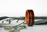 thick_cross_grain_santos_rosewood_ring_with_offset_14k_rose_gold_inlay-4_compact Img